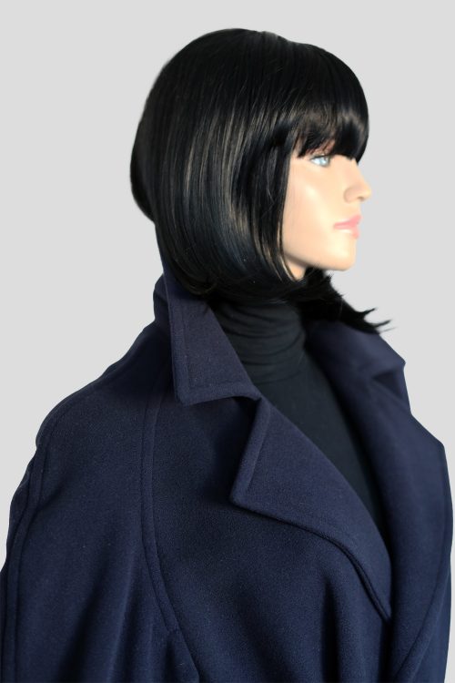 a mannequin with a blue coat