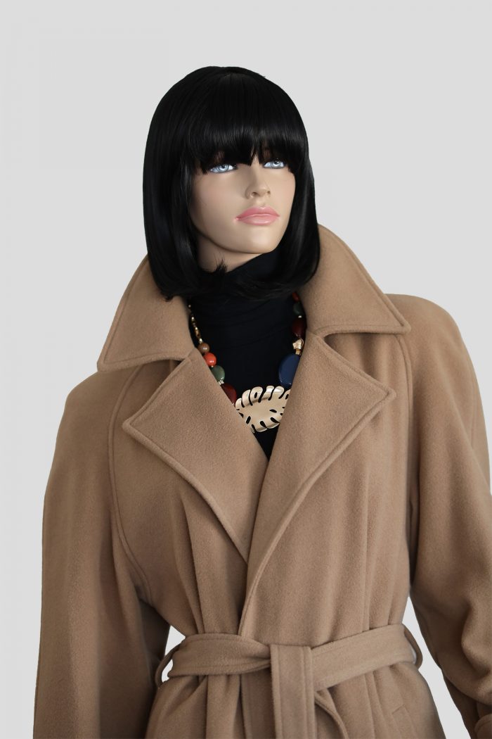 a mannequin wearing a coat