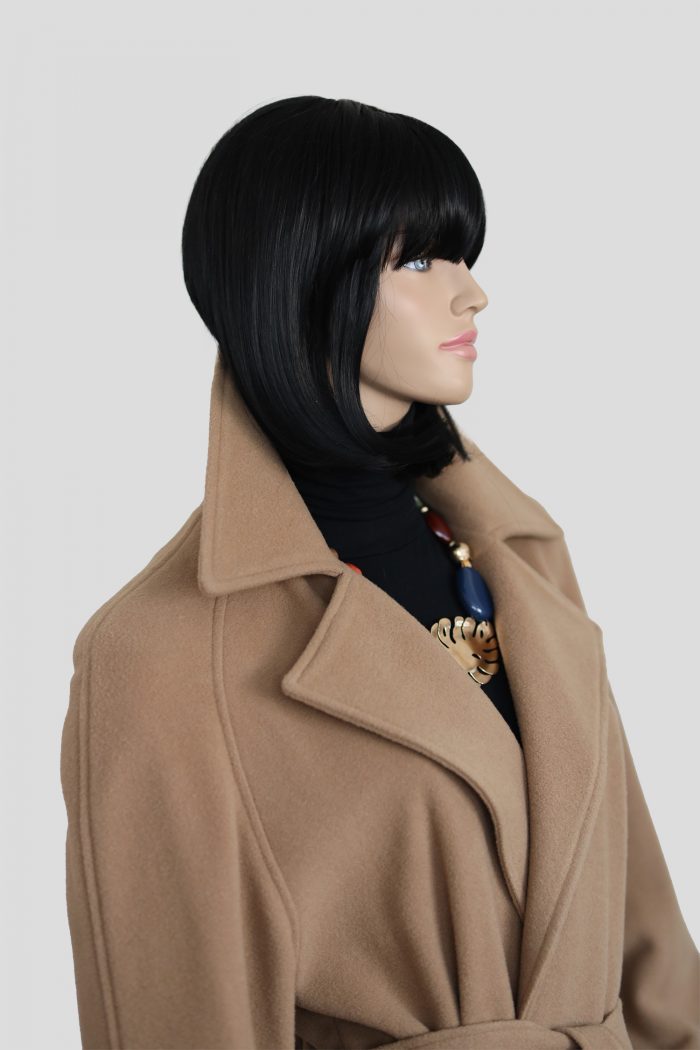 a mannequin wearing a coat