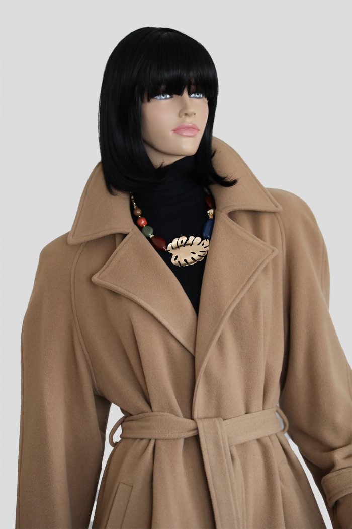 a mannequin wearing a coat